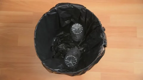 Stop Motion Plastic Bottles Dropped in Bin Stock Footage 157173462