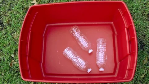 Stop Motion Plastic Recycling Bin Bottles Stock-Footage 70372422