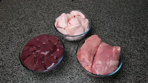 In stop motion pork,  lard are placed in three glass bowls on the table Video stock 204159372