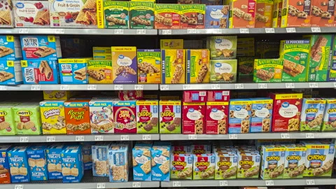 Stop Motion Retail Shelf in Grocery Store Aisle Filled With Variety of Food.. Video stock 336615984