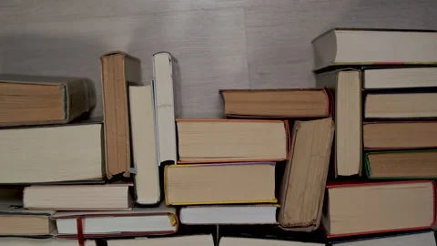 Stop Motion of Stacked old books background texture for education concept 库存影片 334531563