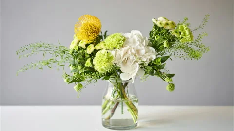 Stop motion, step by step installation of flowers in a vase. Flowers bunch, set Stock Footage 139790444