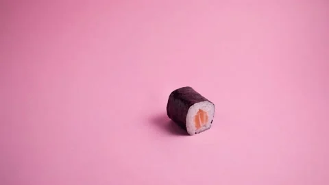 Stop motion of sushi roll rotating on itself Stock Footage 154471974