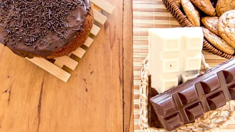 Stop motion Sweets on the table. Chocolate cake, brownie, cookies and chocol Stock Footage 155063158