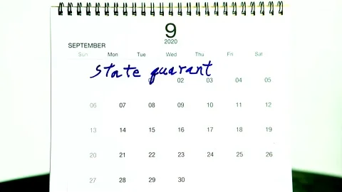 Stop motion of ticking on state quarantine  schedule   , in  door  Chiangmai Tha Stock Footage 147013126