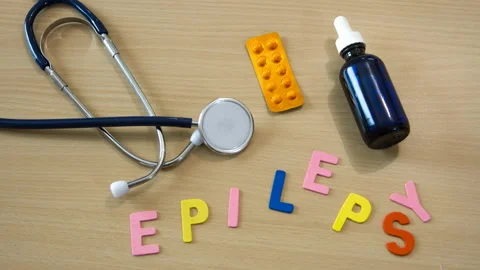 Stop motion time lapse of word with colorful epilepsy letters on a table with Stock Footage 135458719