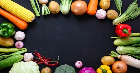 Stop motion top view a vegetables on wood table ,for copy space , 4K video Stock Footage 90599311