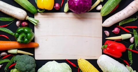 Stop motion top view a vegetables on wood table ,for copy space , 4K video Stock Footage 90603746