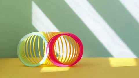 Stop motion from toy plastic colorful rainbow spiral, antistress concept. Stock Footage 191555863