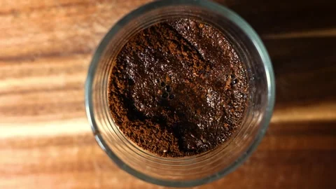 Stop Motion Transformation of Ground Coffee Stock Footage 344571153
