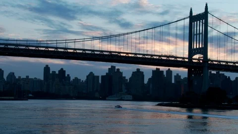 Stop-motion of Triborough/RFK Bridge with view of skyline, water and boats 스톡 동영상 106025055