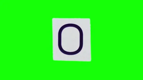 Stop motion of unwrapping sheet of paper with lowercase letter o against alpha Stock Footage 251478671
