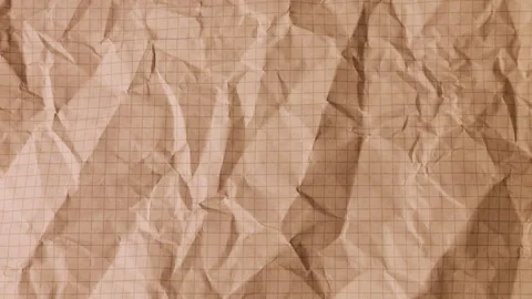 Stop motion of various crumpled craft paper sheets in warm terracotta and brown Stock-Footage 330275601