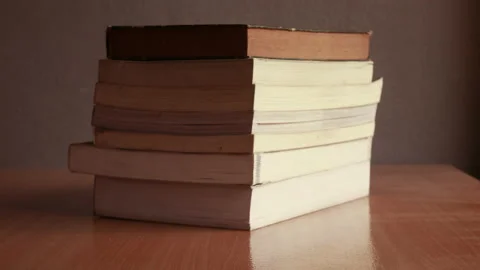 Stop motion VDO books piles. Video stock 130431164