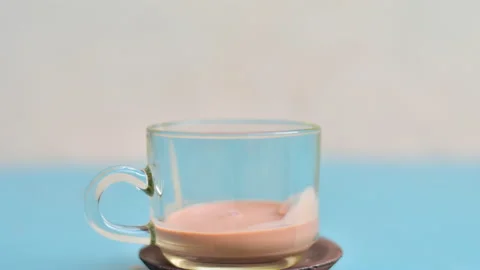 Stop motion VDO mikl in cup in crease. Stock Footage 130606869