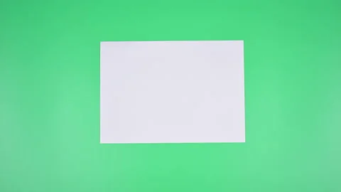 Stop motion VDO, paper ball unwrapping on green background. Stock Footage 197052706