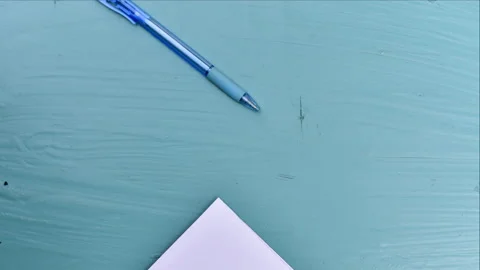 Stop motion VDO pen and white paper moving. Stock Footage 130445294