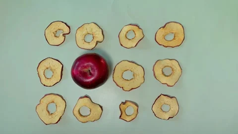 Stop motion video with apple and apple chips Stock Footage 271540327