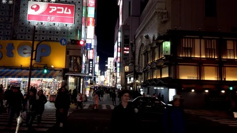 Stop-motion video with crowd moving by the Dotonbori street at night. Stock Footage 124330696