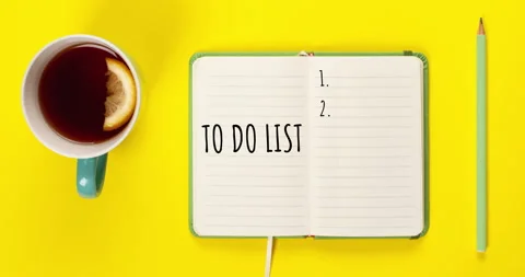 Stop motion video of To do list concept. Mint color Tea cup and notebook with to Stock Footage 274227040