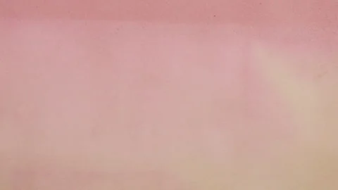 Stop motion video of eco-friendly, plant-dyed craft paper background.  Video stock 330276281