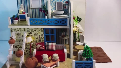 Stop motion video of fall season Halloween decoration of toy house Stock Footage 143228581