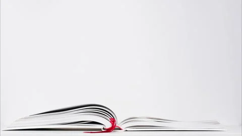 Stop motion video of flipping or turning the pages of a large book isolated on Stock Footage 170816411