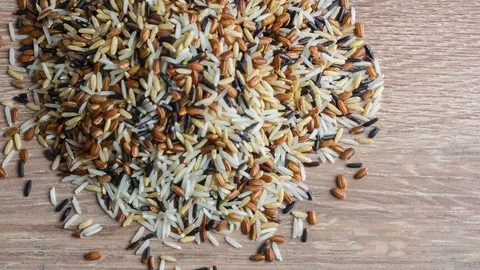 Stop motion video. The mixed different rice varieties are divided into five Stock Footage 71198311