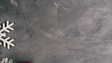 Stop motion video of numbers 2022 appearing on gray concrete background with Stock Footage 164705860