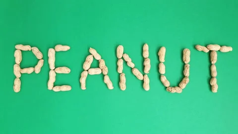 Stop motion video of peanuts forming the word "Peanuts". Stock Footage 161262168
