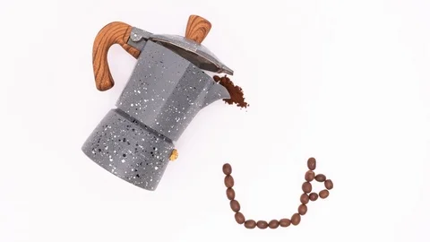 Stop motion video of pouring coffee in cup with mocha pot. Видео 102147449
