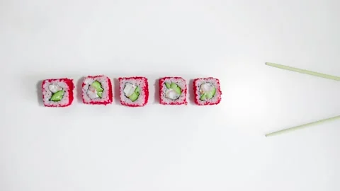Stop motion video sushi rolls. The plot, eating with chopsticks Video stock 136659185