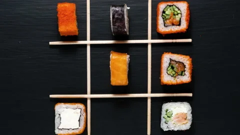 Stop motion video sushi rolls. The plot, eating with chopsticks Stock Footage 237361413