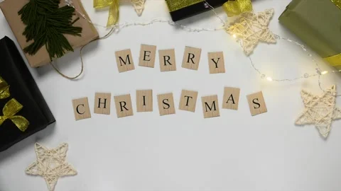 Stop motion video with the title Merry Christmas moving in the frame. Stock Footage 165495831