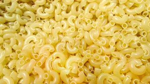 Stop motion video with yellow pasta. Stock Footage 202604360