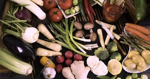 Stop motion view of an assortment of fresh, healthy, organic vegetables Stock Footage 72623227