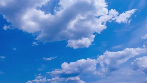 Stop motion with white clouds on a blue sky. Stock video with beautiful clouds Stock Footage 253657696