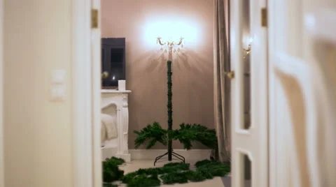 Stop motion. Without people mounted an artificial Christmas tree, gradually Stock Footage 68010319