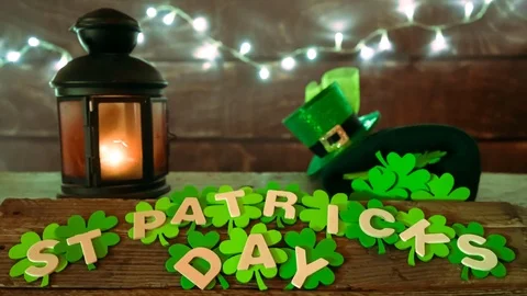 Stop Motion of wooden St Patrick's day text over shamrocks Stock Footage 101299826