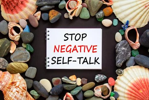 Stop negative self-talk symbol. Concept words Stop negative self-talk on a be Stock Photos