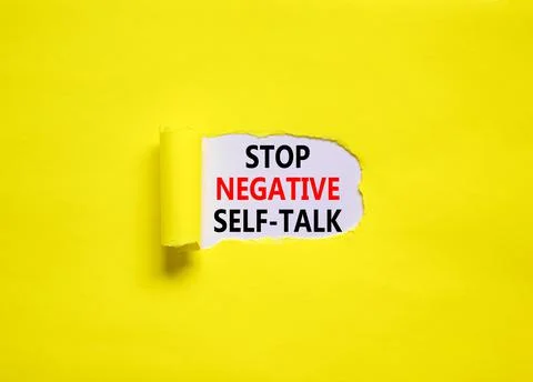 Stop negative self-talk symbol. Concept words Stop negative self-talk on a be Stock Photos