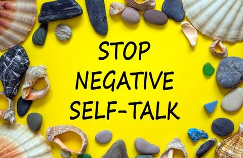 Stop negative self-talk symbol. Concept words Stop negative self-talk on a be Stock Photos