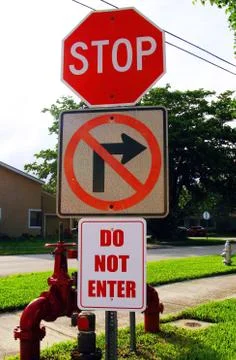 Stop No Left Turn Do Not Enter Triple Sign Stock Photos