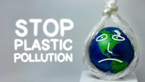 Stop plastic pollution. A plastic stretch film kills the planet earth. Stock Photos