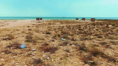 Stop polluted dump garbage on shore sea. Rescue ecological environment coast 4K. Stock Footage 253395657