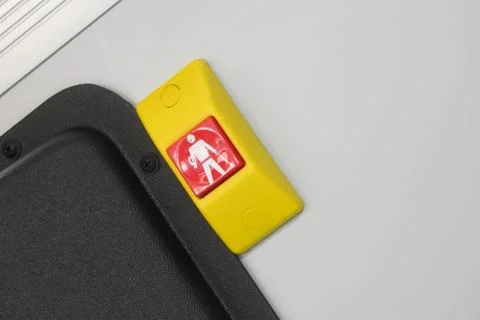 Stop on request button on bus Foto stock