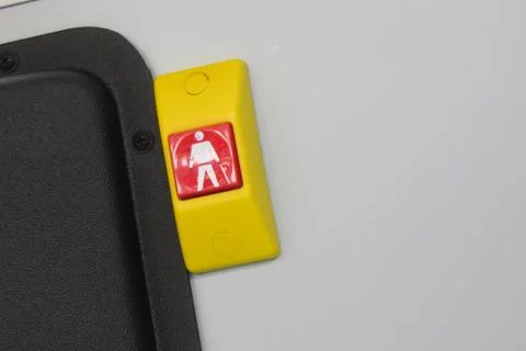 Stop on request button on bus Stock Photos