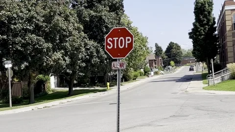 Stop road sign at intersection Stock Footage 279514809