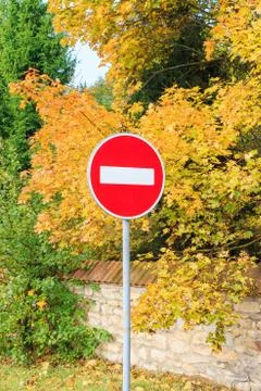 Stop sign against forest background Stock Photos