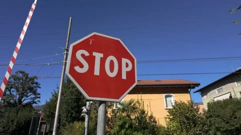 Stop sign at Dervio train station, Lake Como Stock Footage 318313449